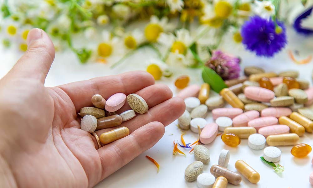 Homeopathy and dietary supplements from medicinal herbs. Selective focus.